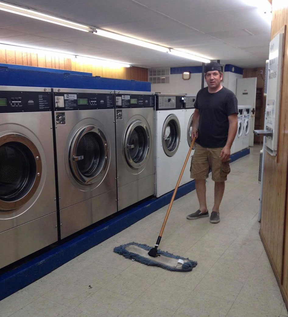 Steve the founder sweeping laundromat